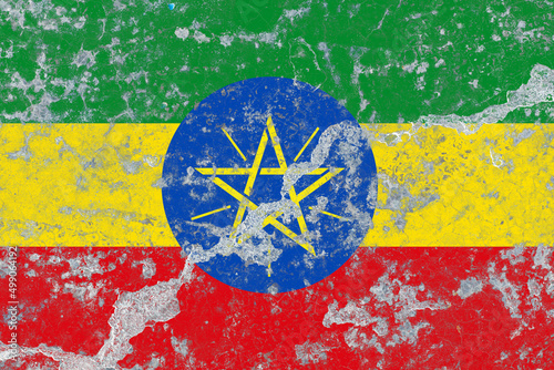 Ethiopia flag on a distressed old concrete wall surface photo