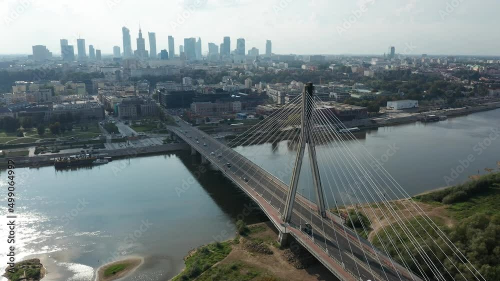 Aerial view of Warsaw skyline, from Praga side of the Vistula river and Świętokrzyski Bridge in the foreground. Warsaw, Poland. Aerial view of Warsaw skyline, from Praga side of the Vistula river and Świętokrzyski Bridge in the foreground. Warsaw, Poland.