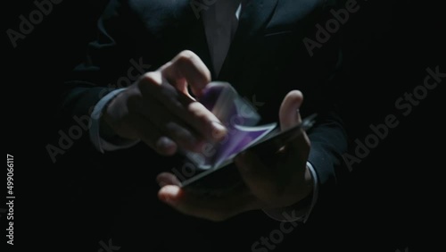 playing card flies from hand to hand in close-up. High quality FullHD footage