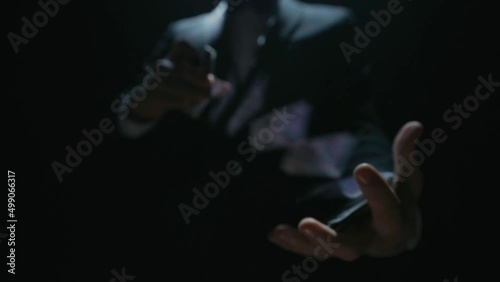 playing card flies from hand to hand in close-up. High quality FullHD footage