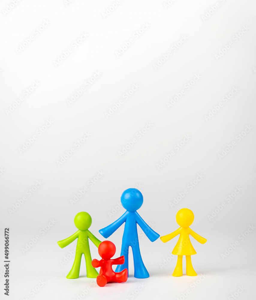 Multicolored men on a gray background. Father and children concept, father's day Multicolored men on a gray background. Father and children concept, father's day