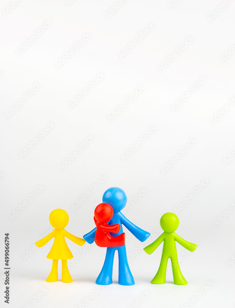 Multicolored men on a gray background. Father and children concept, father's day Multicolored men on a gray background. Father and children concept, father's day