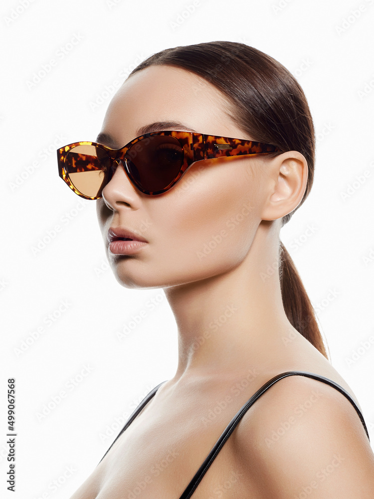 fashion portrait of Beautiful woman in sunglasses fashion portrait of Beautiful woman in sunglasses