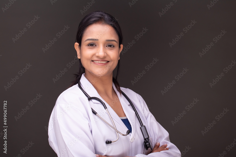 Young doctor woman over isolated background Young doctor woman over isolated background