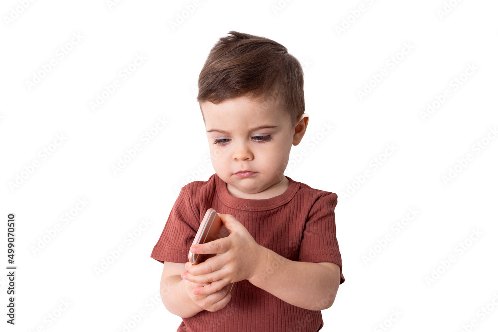 Toddler boy with mobile phone in hands , isolated on white background 
