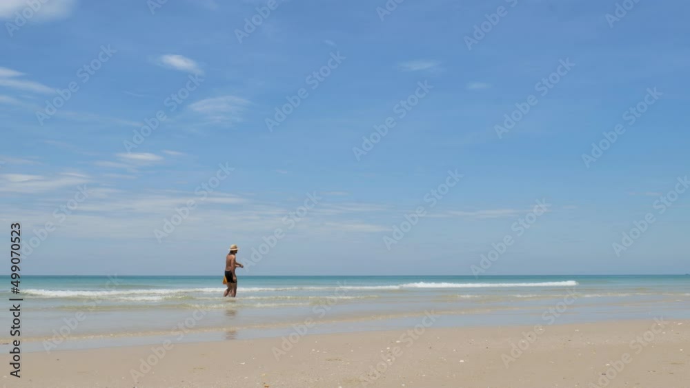 Happy couple in love, playing on the beach at sunny, running and splashing in the waves, travel vacation lifestyle
Happy couple in love, playing on the beach at sunny, running and splashing in the waves, travel vacation lifestyle