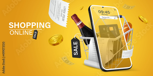 shopping cart had bottles, bread and credit card inside. smartphone is placed in front of the shopping cart. all on a yellow background . mobile shopping concept.Convenient, fast and secure payment.