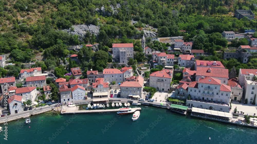 Perast, Montenegro. Aerial View of Idyllic Old Town in Kotor Bay on Sunny Summer Day, Drone Shot Perast, Montenegro. Aerial View of Idyllic Old Town in Kotor Bay on Sunny Summer Day, Drone Shot
