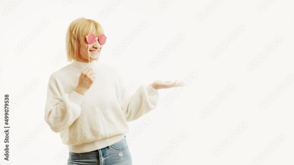 Woman Playing With Funny Red Round Glasses, Isolated On White. - Slow motion Woman Playing With Funny Red Round Glasses, Isolated On White. - Slow motion