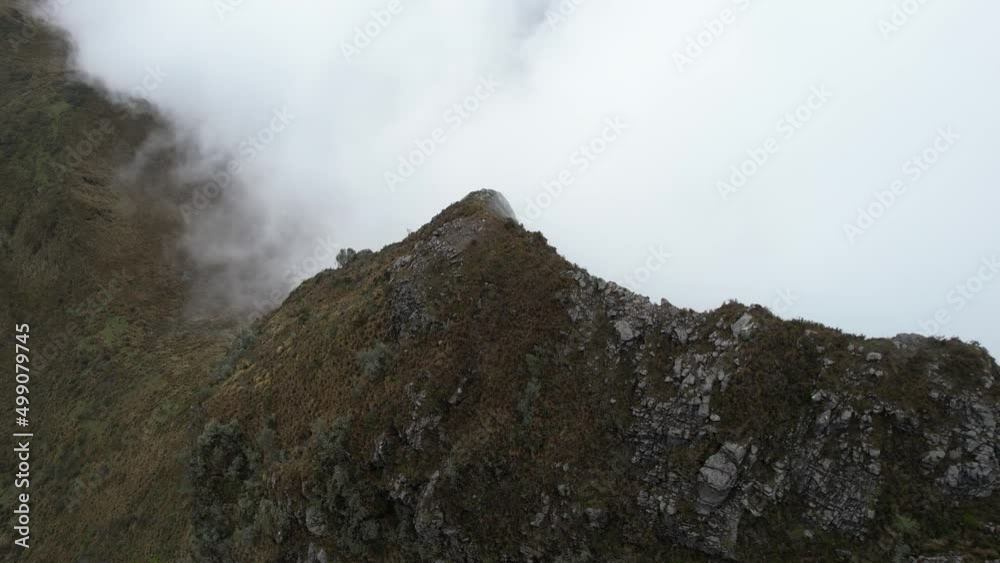 Aerial View of Clouds Above Rucu Pichincha Volcano Hills and Slopes, Quito, Ecuador - Drone Shot Aerial View of Clouds Above Rucu Pichincha Volcano Hills and Slopes, Quito, Ecuador - Drone Shot