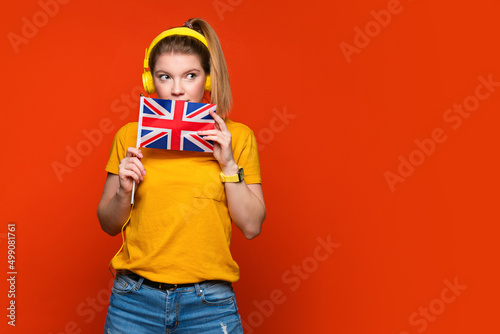 Girl holds small UK flag
