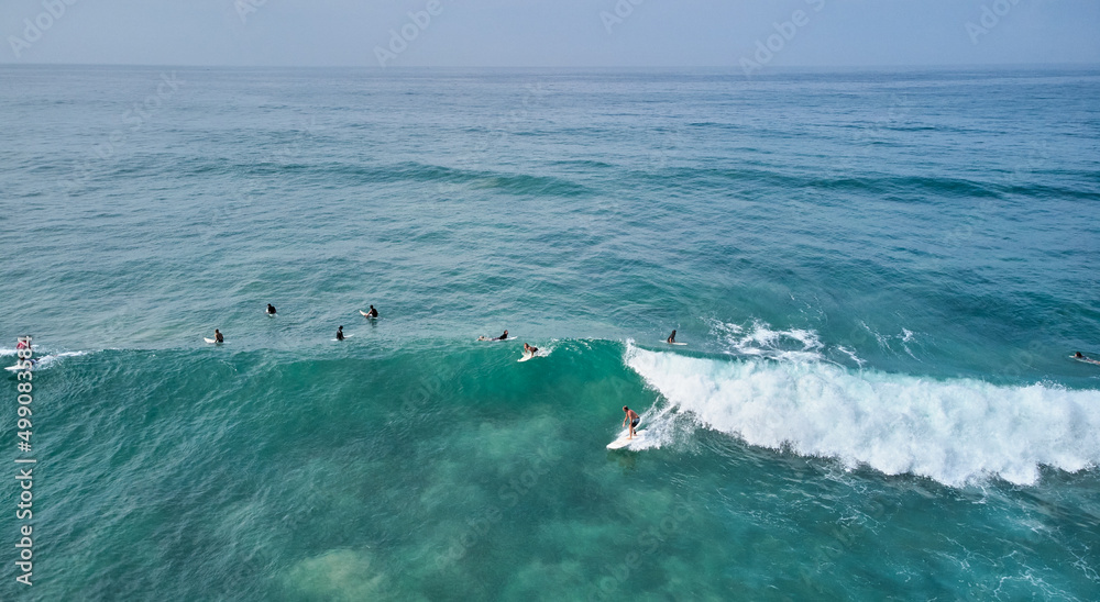 Aerial view of surfers waiting for the wave. Sri Lanka, Midigama Aerial view of surfers waiting for the wave. Sri Lanka, Midigama