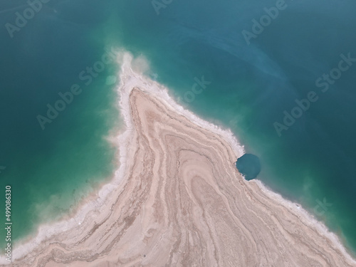 Fotografia, Obraz Aerial shoot of washout or sinkhole on Salty shore of Dead Sea Seascape