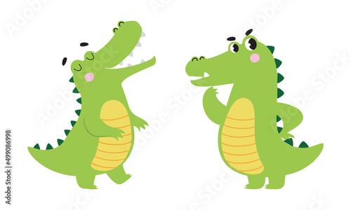 Cute friendly green crocodiles set. Lovely curious baby alligators characters cartoon vector illustration