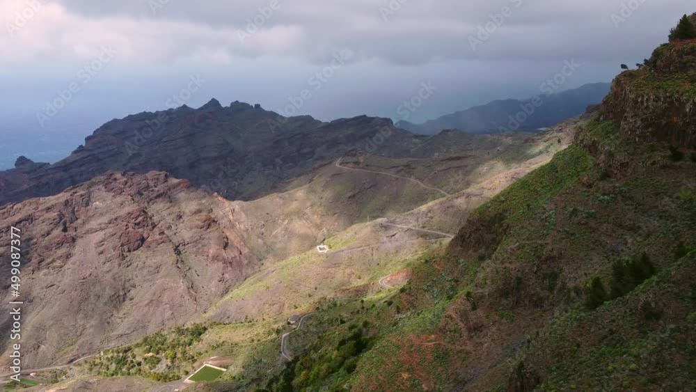 Idyllic Mountain Landscape On A Cloudy Day In Mirador Ermita del Santo, La Gomera, Spain - aerial shot Idyllic Mountain Landscape On A Cloudy Day In Mirador Ermita del Santo, La Gomera, Spain - aerial shot