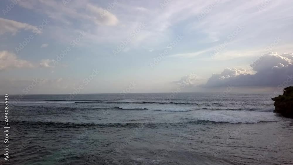 Smooth aerial view lift off aerial drone flight footage of idyllic dream beach with big waves beachfront in Nusa Lembongan at midday noon time in Bali 2017. Cinematic above view by Philipp Marnitz Smooth aerial view lift off aerial drone flight footage of idyllic dream beach with big waves beachfront in Nusa Lembongan at midday noon time in Bali 2017. Cinematic above view by Philipp Marnitz