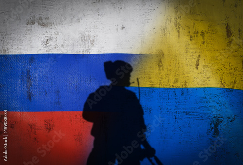 Картината върху платно Russia vs Ukraine flag on cracked wall, concept of war between russia and ukrain