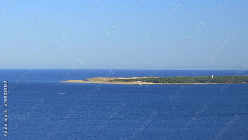 Head point of the Cap Ferret peninsula seen from the top of the Dune du Pilat on the Arcachon Bay in France Head point of the Cap Ferret peninsula seen from the top of the Dune du Pilat on the Arcachon Bay in France