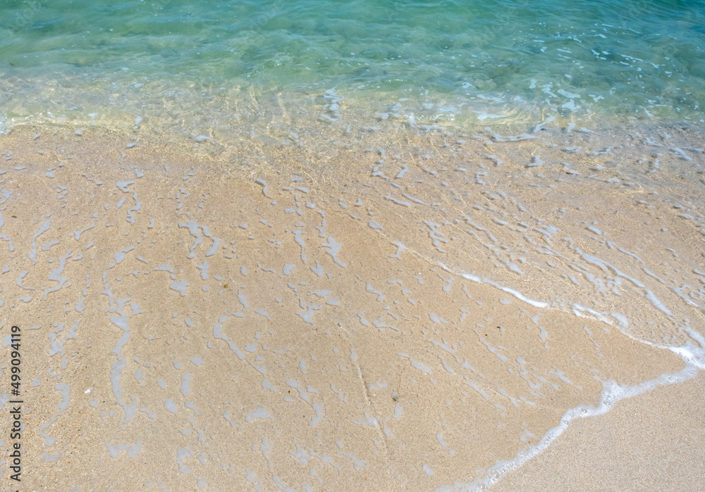 Golden sand and clear water of a beach on Koh Chang island in Thailand Golden sand and clear water of a beach on Koh Chang island in Thailand
