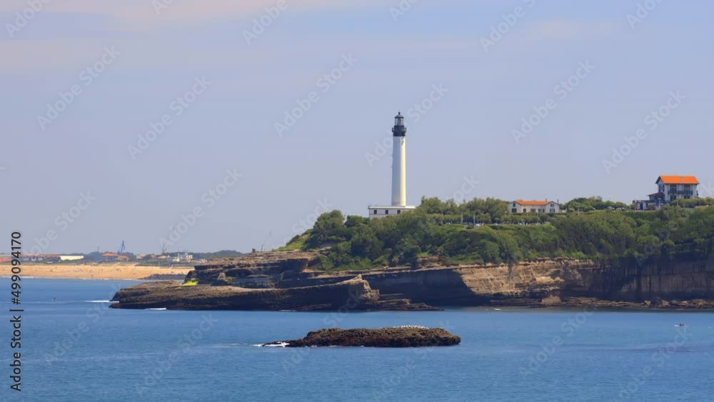Biarritz lighthouse and the Atlantic Ocean on a summer day, France Biarritz lighthouse and the Atlantic Ocean on a summer day, France