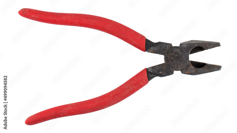 Old pliers with rubber grips in red on a white background. Top view. Repair or building concept. Old pliers with rubber grips in red on a white background. Top view. Repair or building concept.