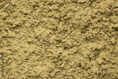 Textured yellow (mustard) plaster for exterior facades