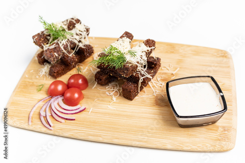 croutons, wooden board, white background
