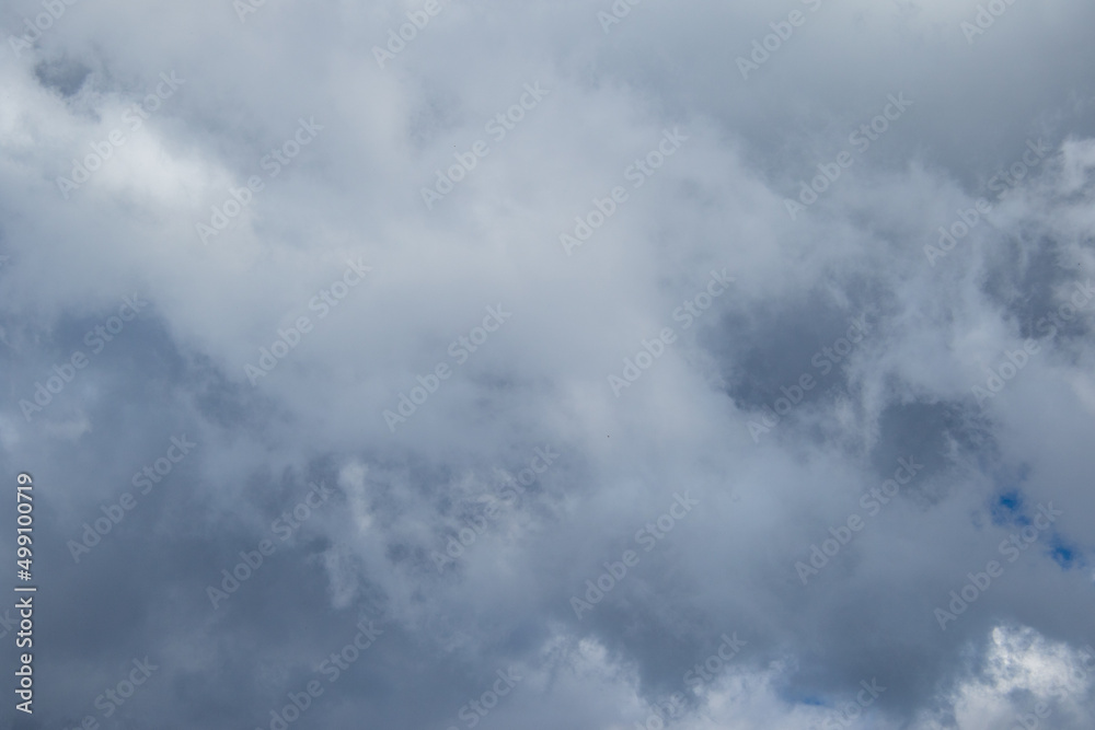Cloudscape with shapes and faces image for background use Cloudscape with shapes and faces image for background use