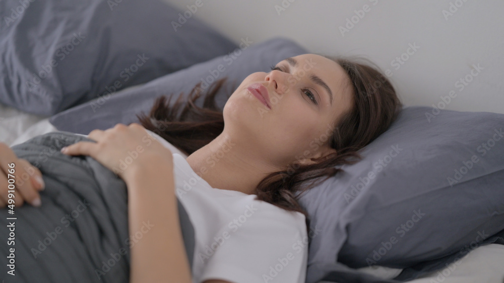 Woman Awake in Bed Thinking 