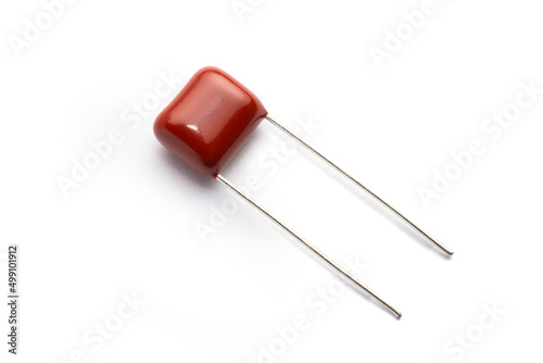 Radial metallized polypropylene film capacitor isolated on white background