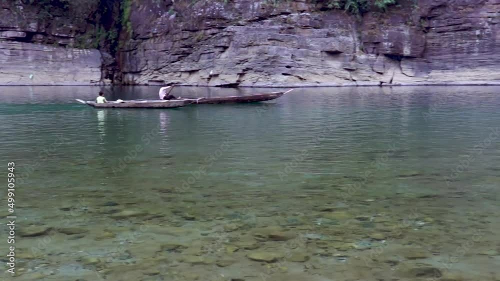 traditional wood boat running at river clear water from different angle traditional wood boat running at river clear water from different angle