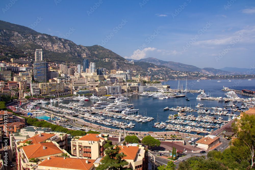 Obraz na płótnie Panoramic aerial view of Monaco and Port Hercule, sweeping views of the city, mountains and harbor, luxury yachts and apartments in La Condamine district, city centre Monte Carlo, Monaco,Cote d'Azur w salonie