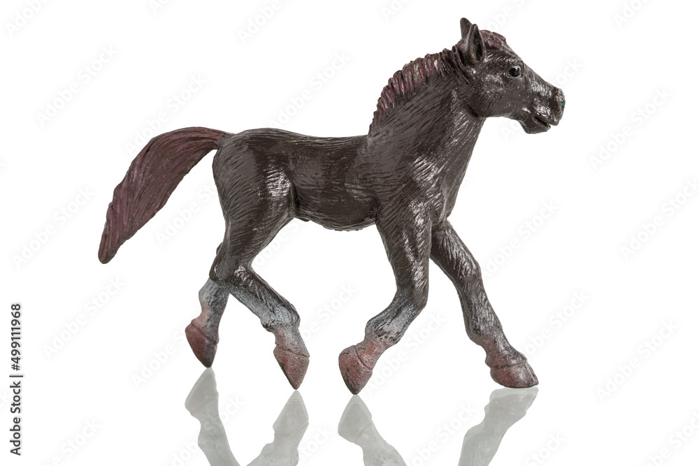Fototapeta premium horse toy figurine isolated on white background