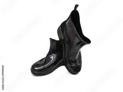 black rubber boots on a white background
