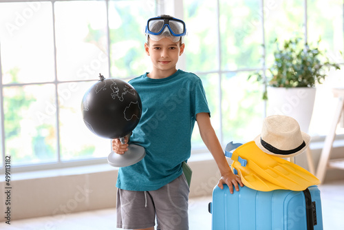 Cute little boy with snorke...