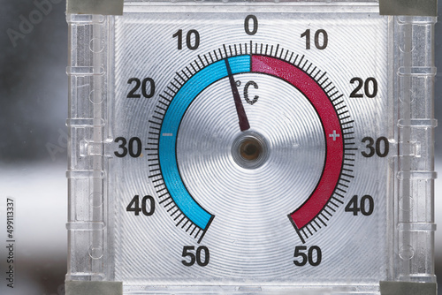 Outdoor window thermometer shows negative temperature in degrees Celsius photo