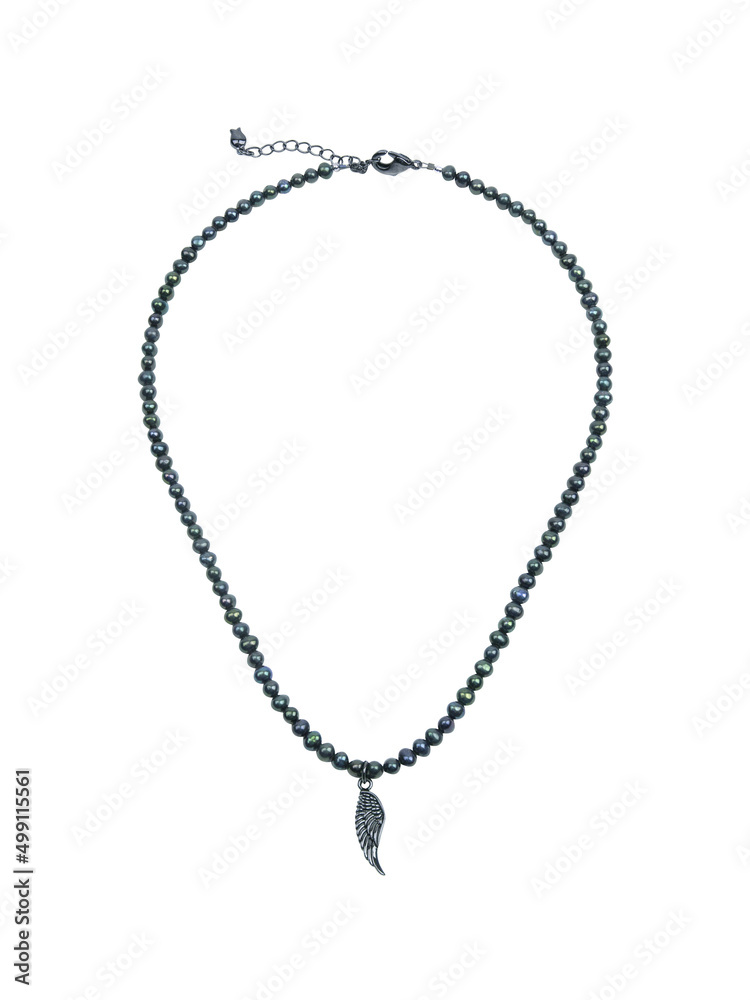 Female silver wing shaped pendant with dark blue beads necklace isolated on white Female silver wing shaped pendant with dark blue beads necklace isolated on white