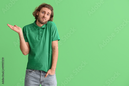Handsome man in t-shirt shr...