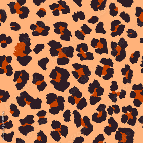 Brown, khaki and tan leopard spots in seamless, repeating pattern. 
