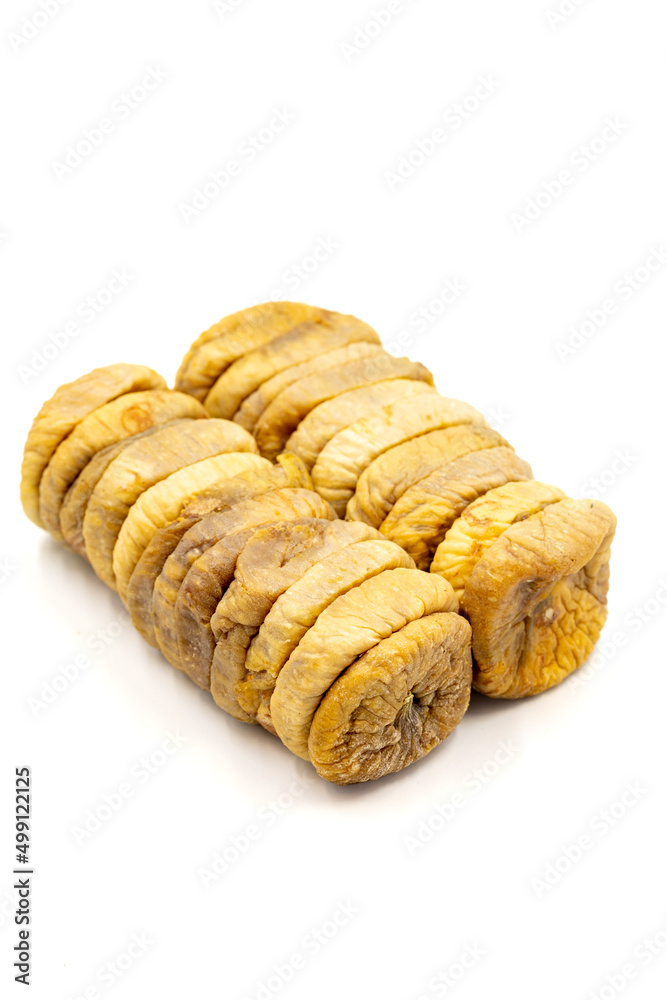 Dried figs isolated on a white background. Close-up. Dried figs isolated on a white background. Close-up.