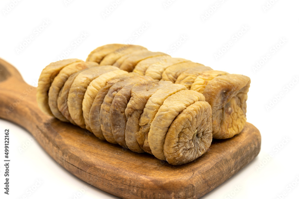 Dried figs isolated on a white background. Close-up. Dried figs isolated on a white background. Close-up.
