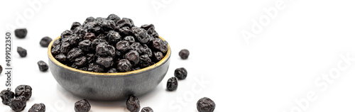 Dried blueberries isolated on a white background. Bulk blueberries. close up. Copy space. Space for text