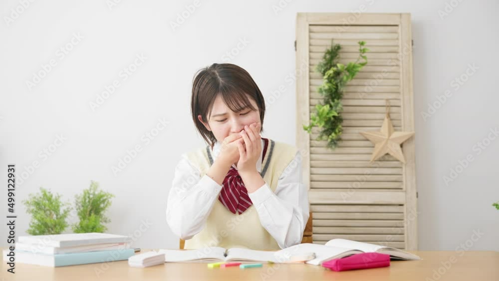 頭をかかえる女子高生 頭をかかえる女子高生