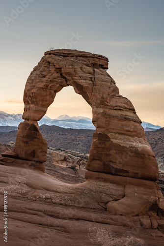 Tight Shot of Delicate Arch With The Snow Covered La Sal Mountains