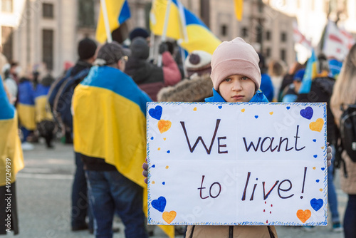 Demonstration in support of peace in Ukraine. Inscription "We want to live" in girls hands  © Maryana