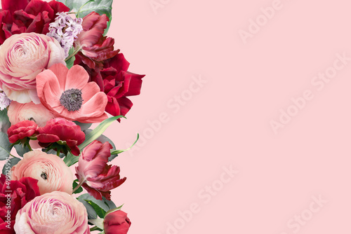 Wallpaper Mural Floral banner, header with copy space. Ranunculus, red rose, tulip and hyacinth isolated on pink background. Natural flowers wallpaper or greeting card. Torontodigital.ca
