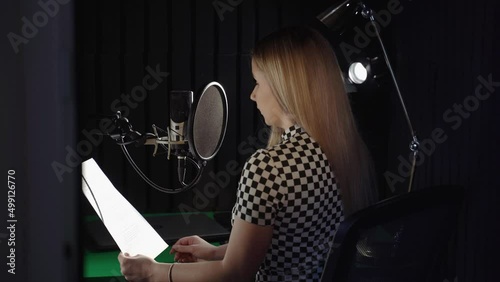 young journalist reading news in the studio