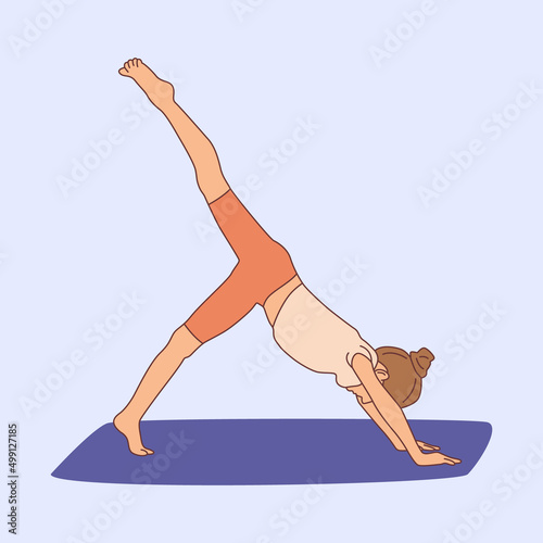 Fototapeta Girl practicing yoga on gymnastic mat
