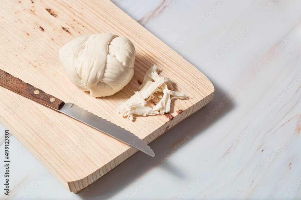 Oaxaca cheese ball called quesillo de oaxaca, mexico. Stock Photo