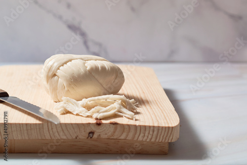 Canvas Print Traditional oaxaca cheese ball or quesillo. Mexican food.